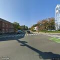 Disabled car at Pleasant Street and Massachusetts Ave