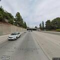 Police chase involving brown vehicle on freeway