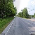 Tree partially blocking road on Vermont Route 30