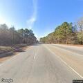 Car hits tree and flips on North US 301