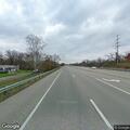Injured raccoon blocking lane on US 23