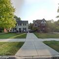 Unknown man in red hoodie reported at window