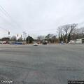 Stopped vehicle blocking part of traffic lane