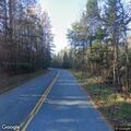 Tree hanging on power lines on Swamp Road