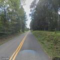 Tree brush blocking roadway on Crest Hill Road
