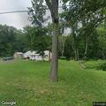 Pickup truck stopped on wrong side of Trout Run Road