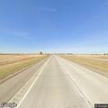 Driver reported throwing beer cans on Highway 2