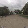 Woman feeling lightheaded at home porch in Ford KS