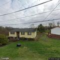 Woman reports man outside home, wants to file charges