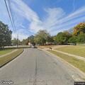 Person found lying near motorcycle on Austin St