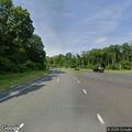 Car with missing tire on Cottage Grove Road
