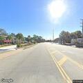 Traffic stop on white GMC Envoy in Darien