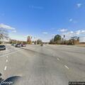 Person experiencing chest pains at highway intersection