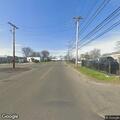 Person with back pain at Hunting Ave and Honeyspot Rd