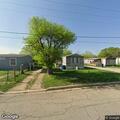 Unknown man reported inside trailer on Avenue C
