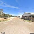 Officers check abandoned building near railroad yard