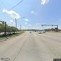 Truck loses cases of water near roadway