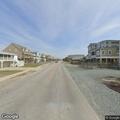 Street flooding from high tides at Holden Beach