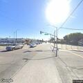 Person experiencing difficulty breathing at intersection
