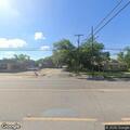 Car hits pole on West Henderson Street