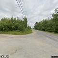 Tree on power lines at Brownfield intersection
