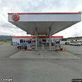 Road hazard from tight cable wires near gas station