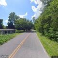 Officer stops silver pickup on railroad property