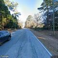 Driver with flat tire on Dunwoody off-ramp