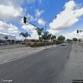 Adult female with difficulty breathing at bus stop