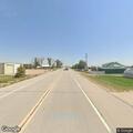 Truck towing boat reported driving out of lane