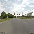 Cyclist in roadway on Sterns and Whiteford Center
