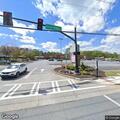 Woman splashed with water at Sid's Pizza