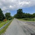 Tree blocking Newton Falls Road near Holcomb