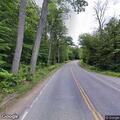 Motorcycle crashes into trees on Sanborn Road