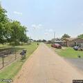 Five acre fire near structure in Cashion