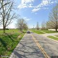 Officer conducts traffic stop on GMC truck