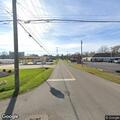Passenger throws items from moving car on Huron