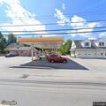 Woman delivering baby in store bathroom near Main Street