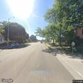 Officer checks small red vehicle at Parker and Glen