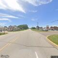 Female in labor in vehicle near park and ride in Bangor
