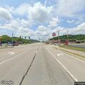 Driver reported drunk and throwing bottles near gas station