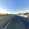 Disabled car on shoulder of northbound M-39