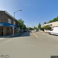 Man possibly intoxicated and down on street corner