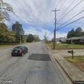Man lying on sidewalk at East North Avenue in Anderson