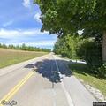 Pickup passes cars on blind hill, nearly causes crash