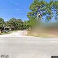 Traffic stop involving red car at Camelot Drive