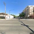 Woman having tremors and difficulty walking near credit union