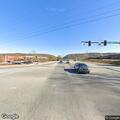 Deputy checks on broken down vehicle at intersection
