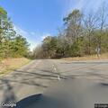 Debris wall reported in roadway near Little Mountain