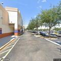 Customer yelling at people behind shopping plaza